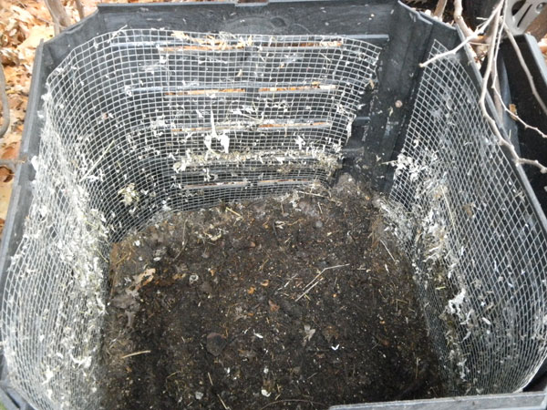 Composter lined with hardware screen to discourage foraging by vertebrates.